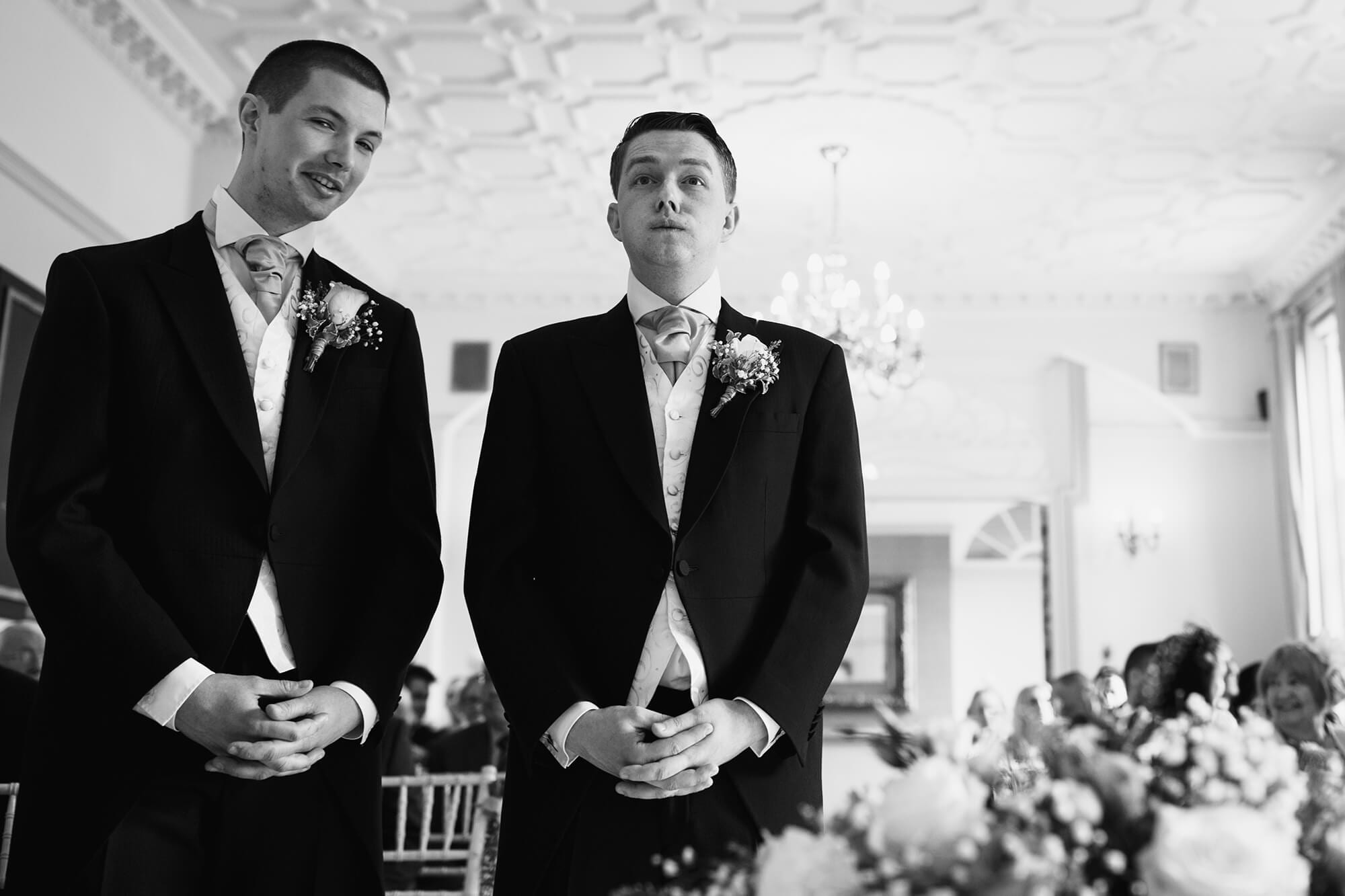 groom waiting nervously for bride