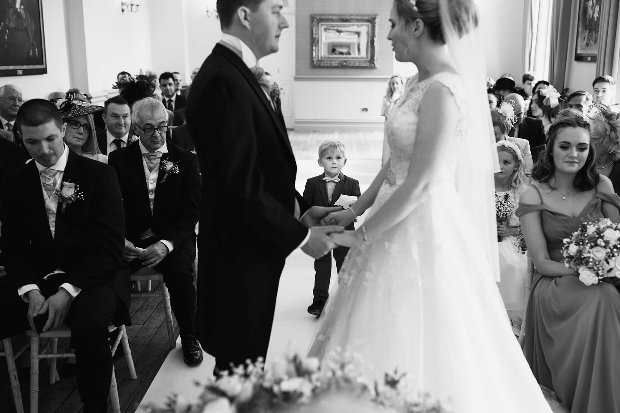 boy brings a tissue to bride