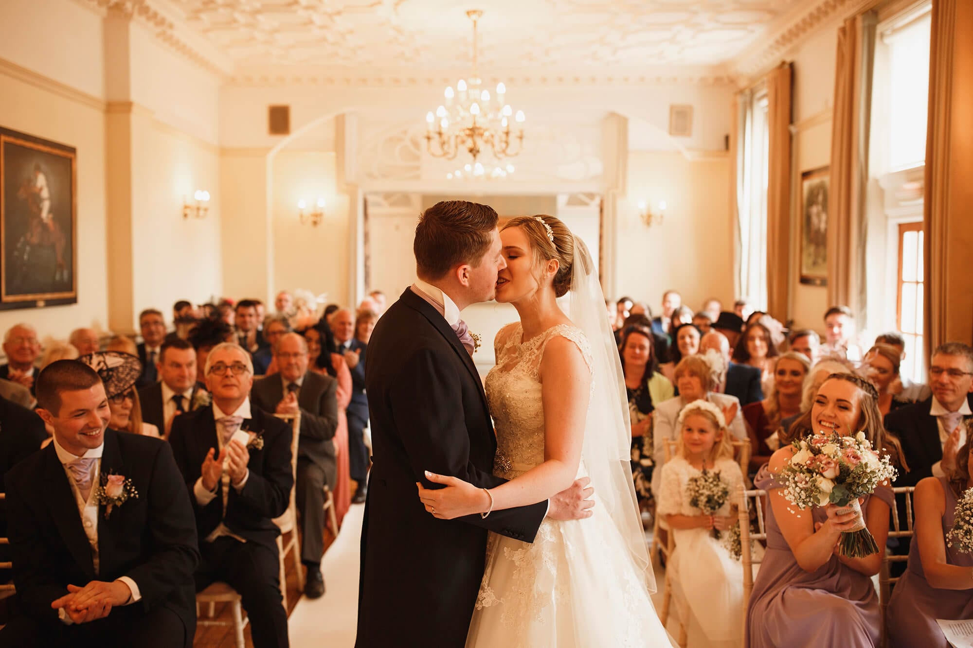 bride and groom kiss at nunsmere hall