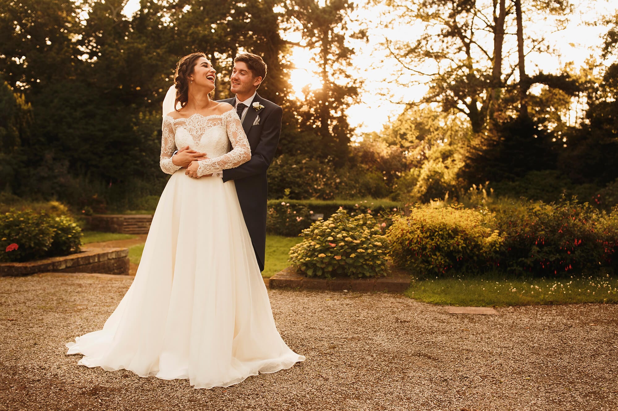 Bride and groom in garden area Thornton Manor House