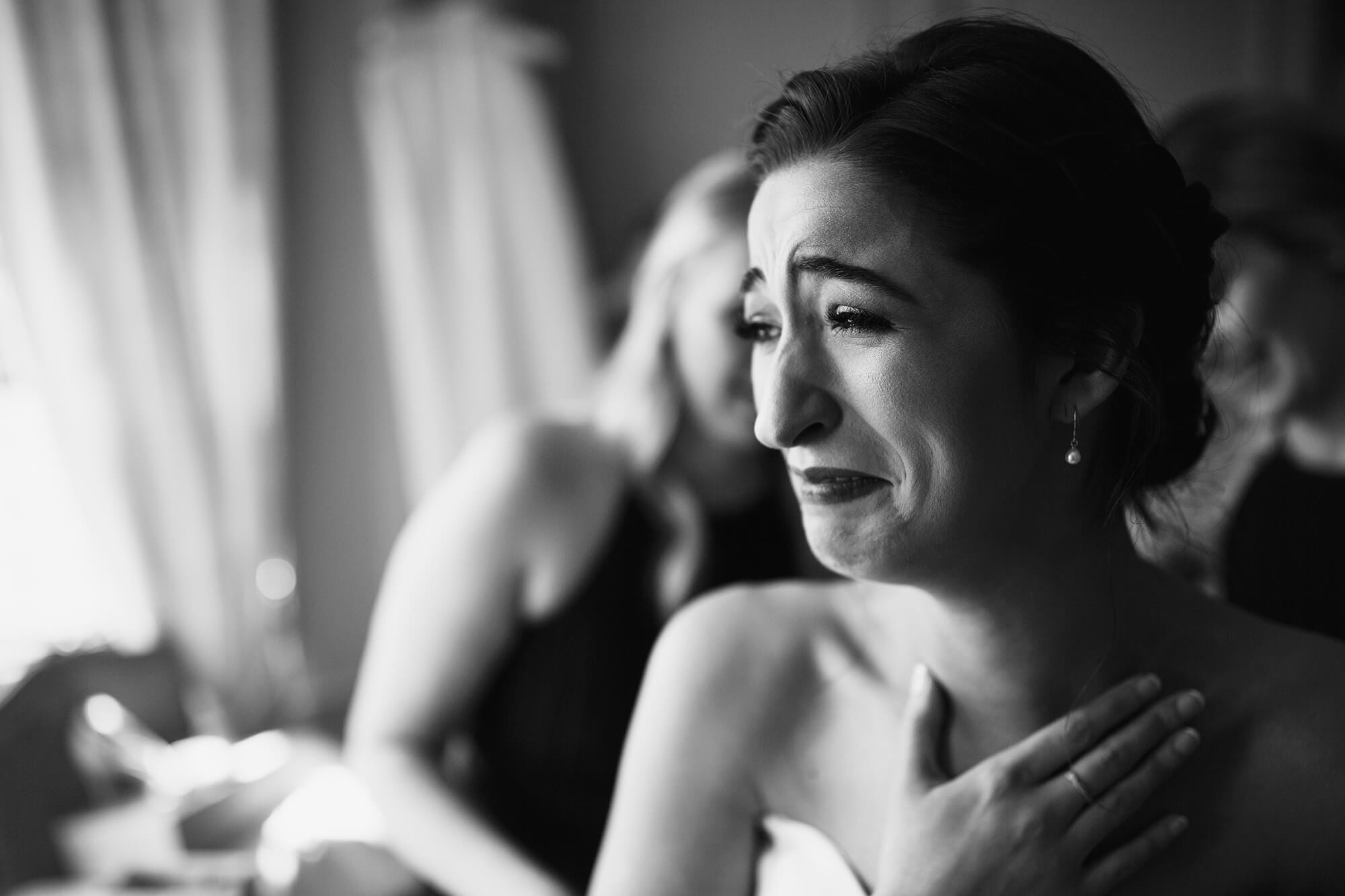 Brides happy tears getting ready Thornton wedding black and white effect