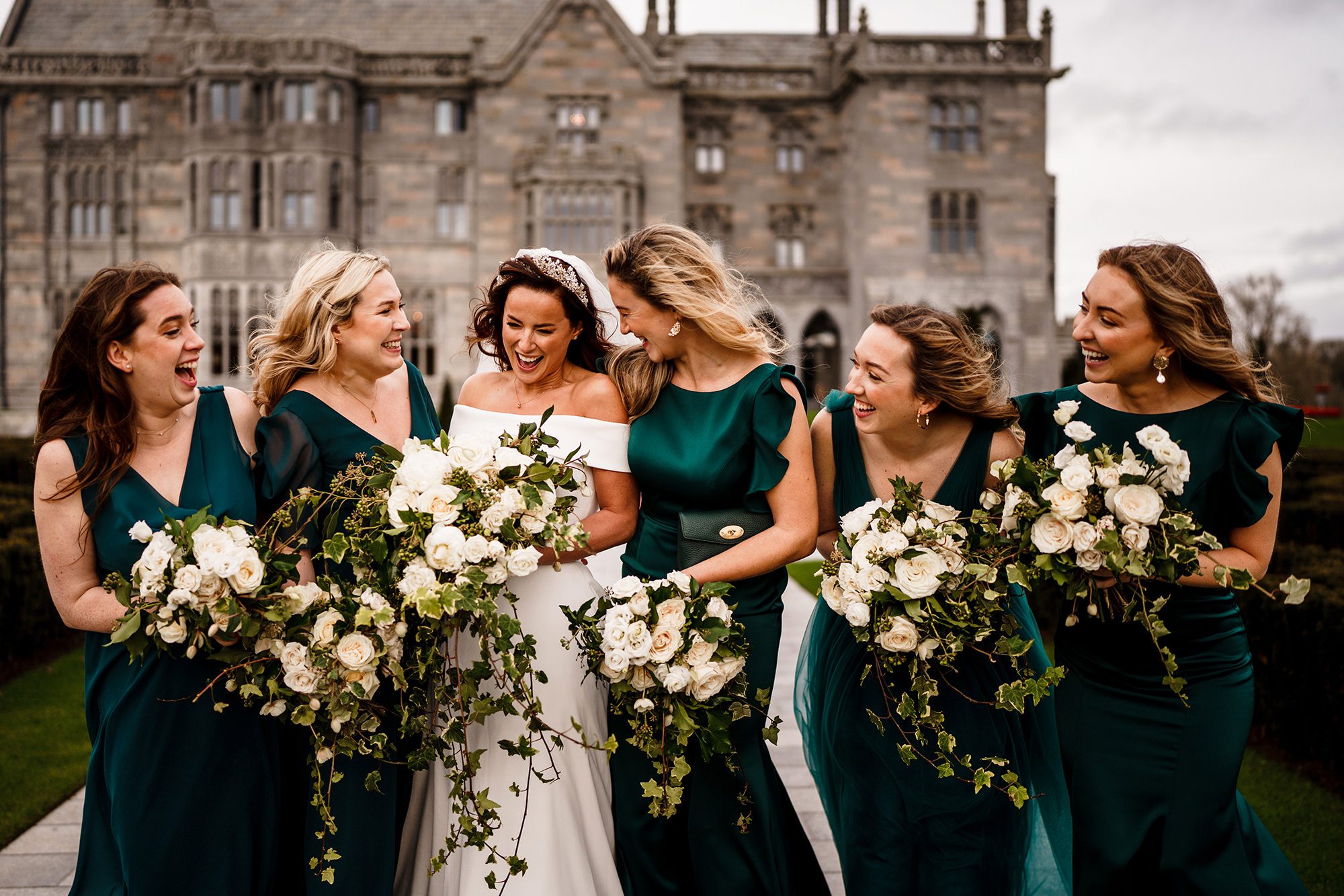 bride and her bridesmaids on windy wedding day in London