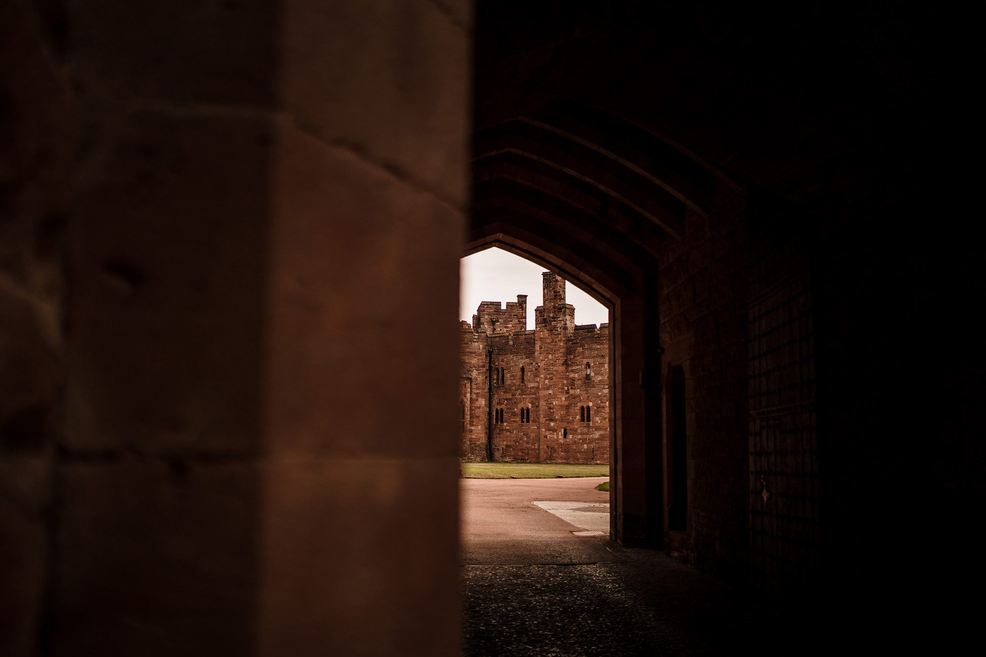 view through an archway at Peckforton Castle