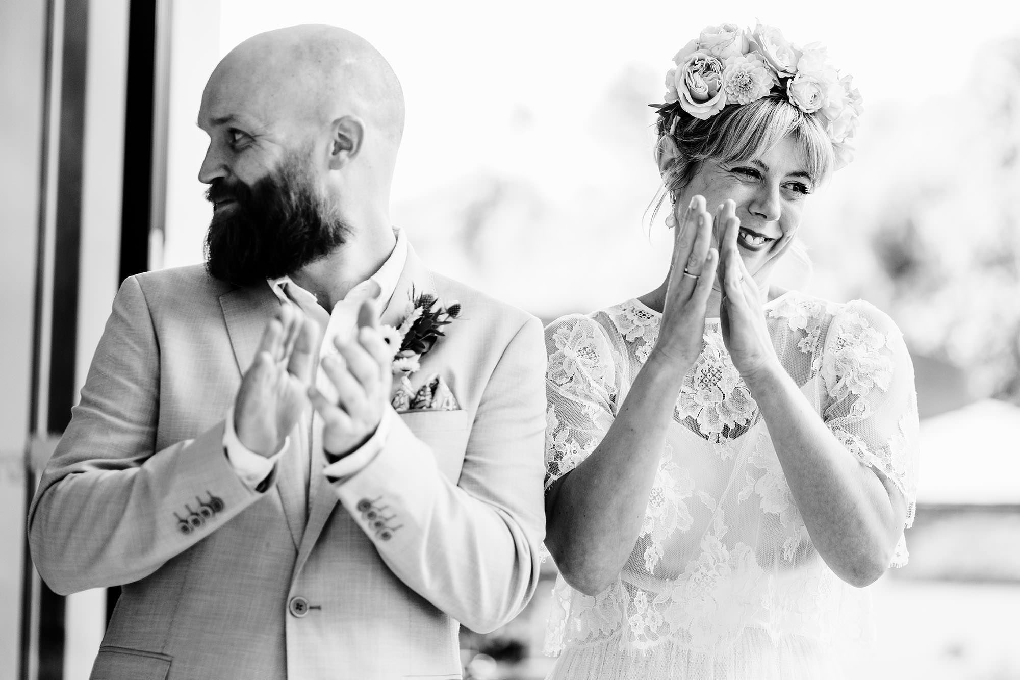 bride and groom clapping at Liverpool wedding