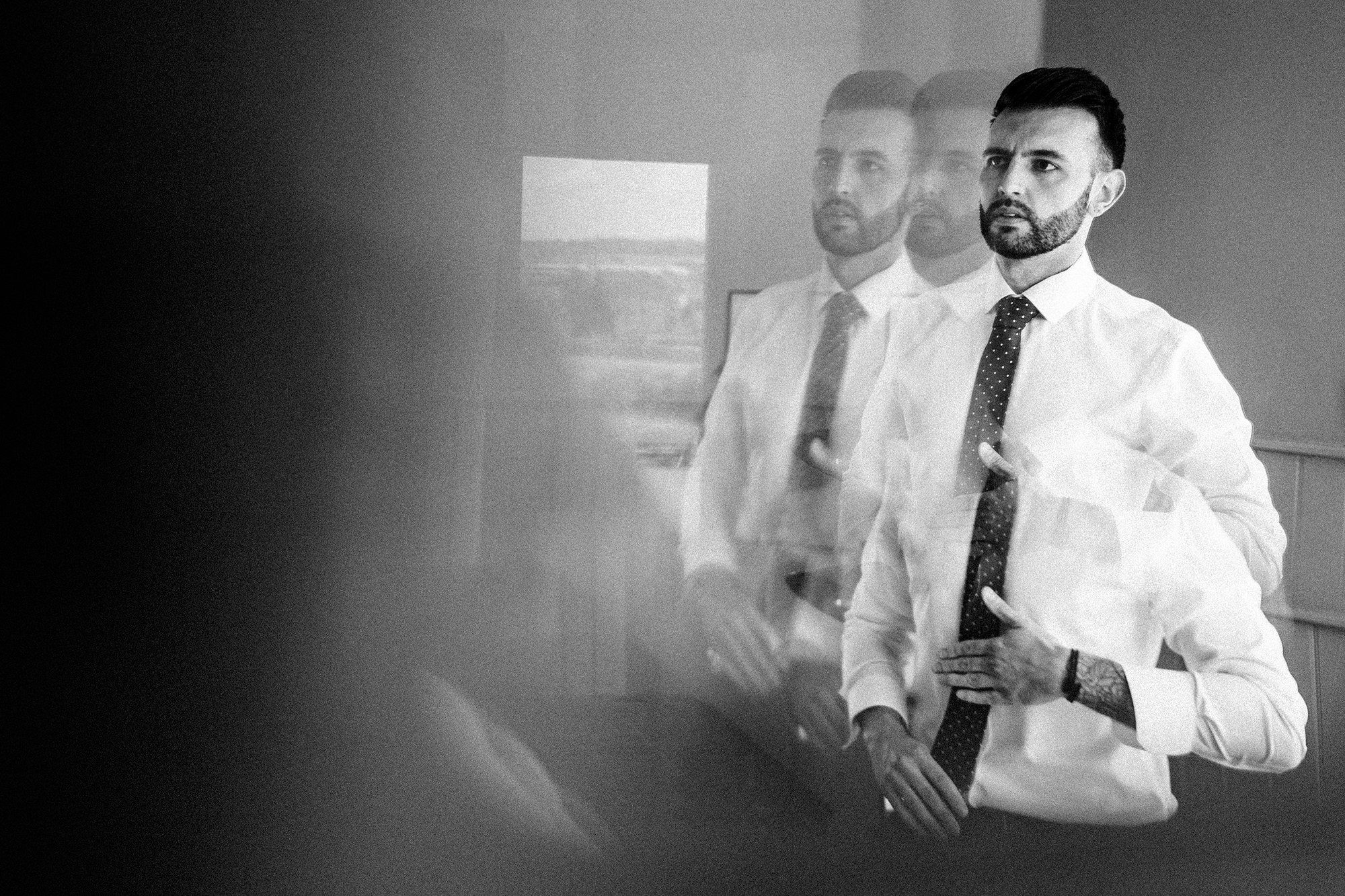 Groom getting ready at Hyde House