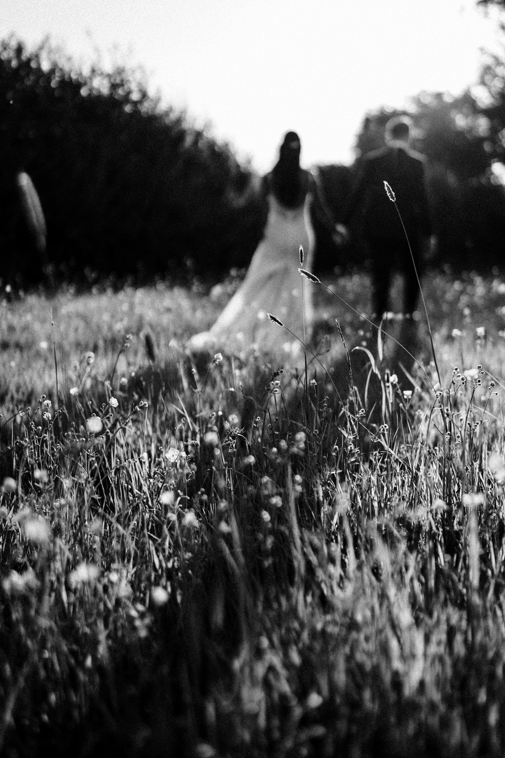 couple walking on their wedding day at Hyde house