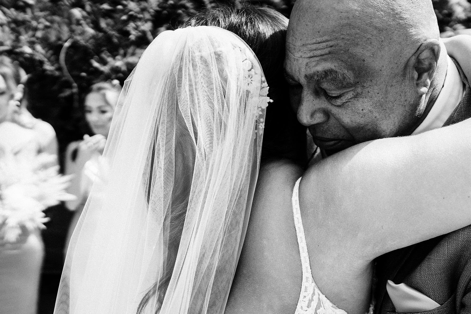 bride hugging her dad on her wedding day