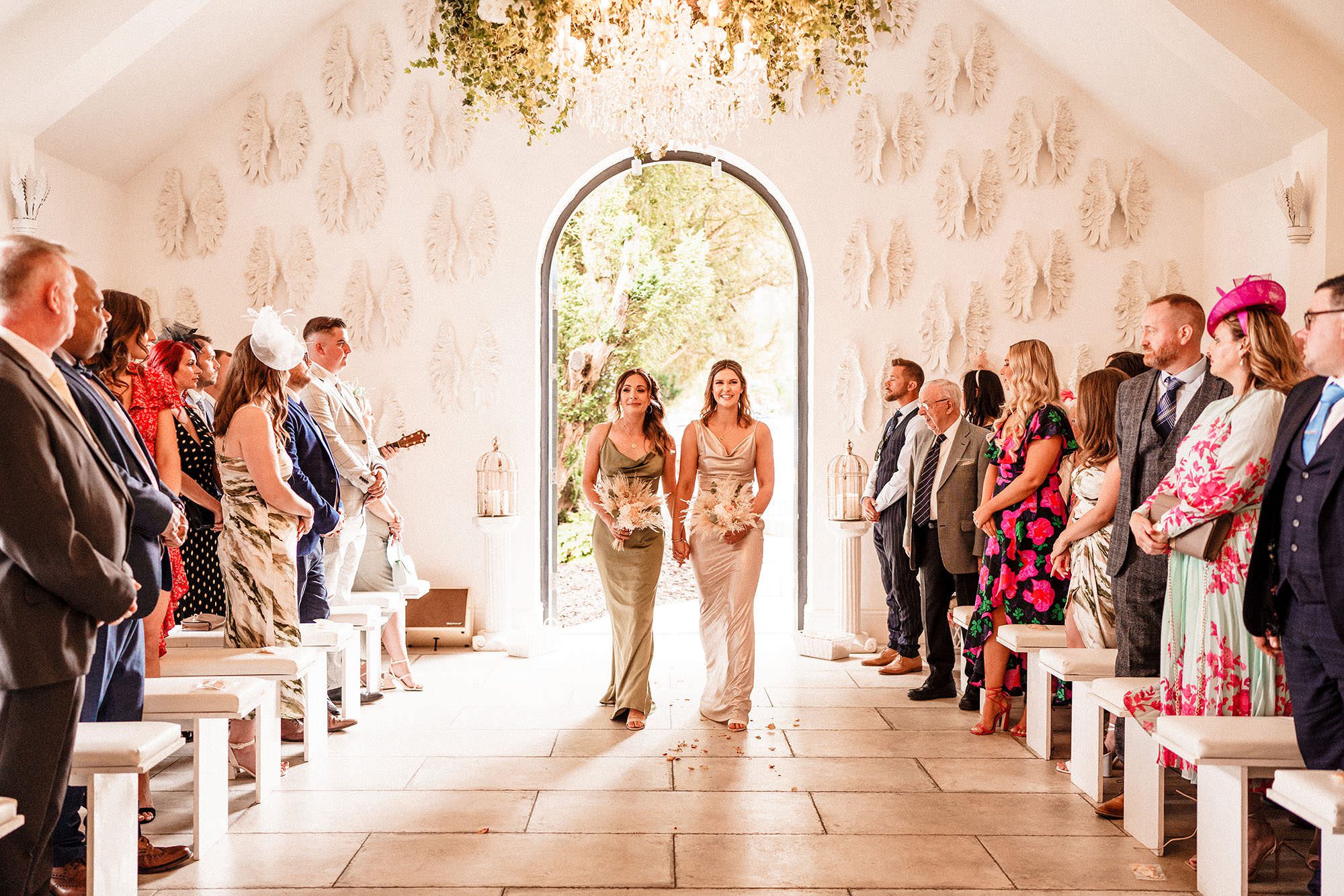 bridesmaids entrance to the wedding at woodhill hall