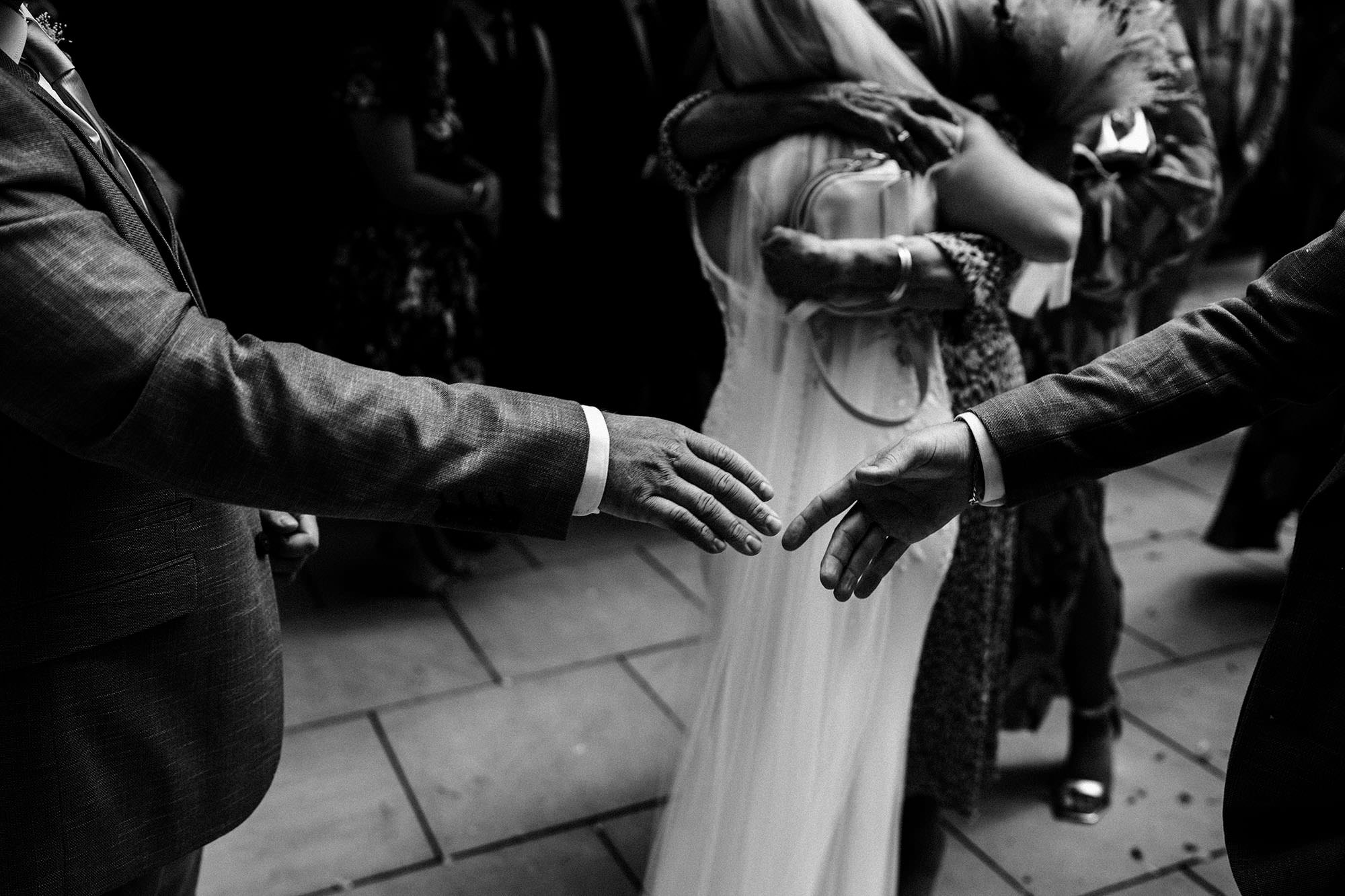 about to shake hands at woodhill hall wedding