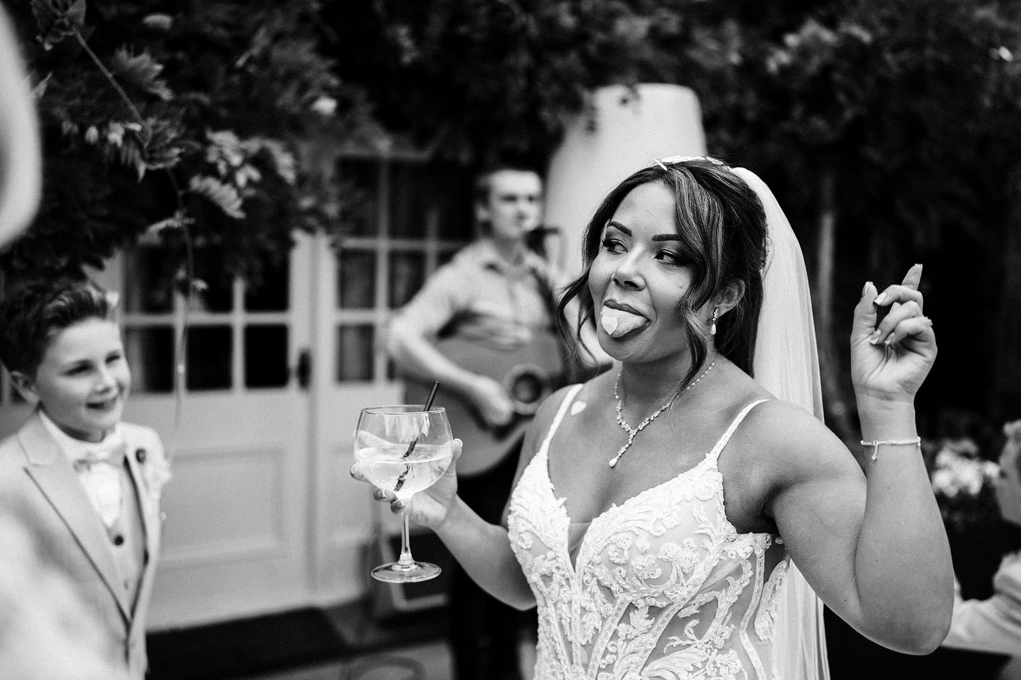 bride with confetti on her tongue