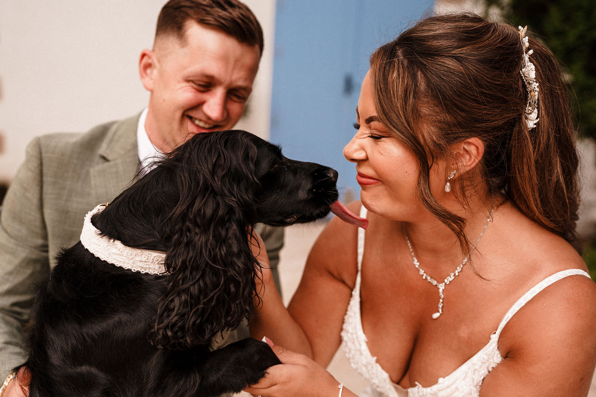 bride and her dog on her wedding day