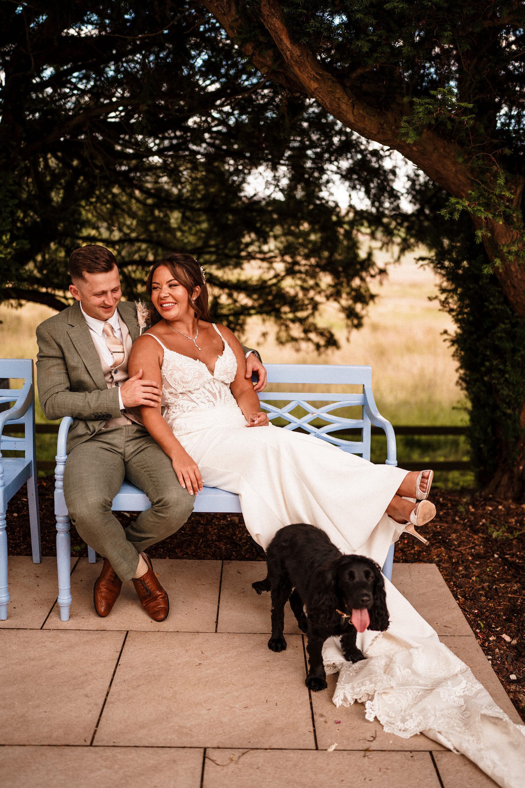 bride and groom relax on wedding day
