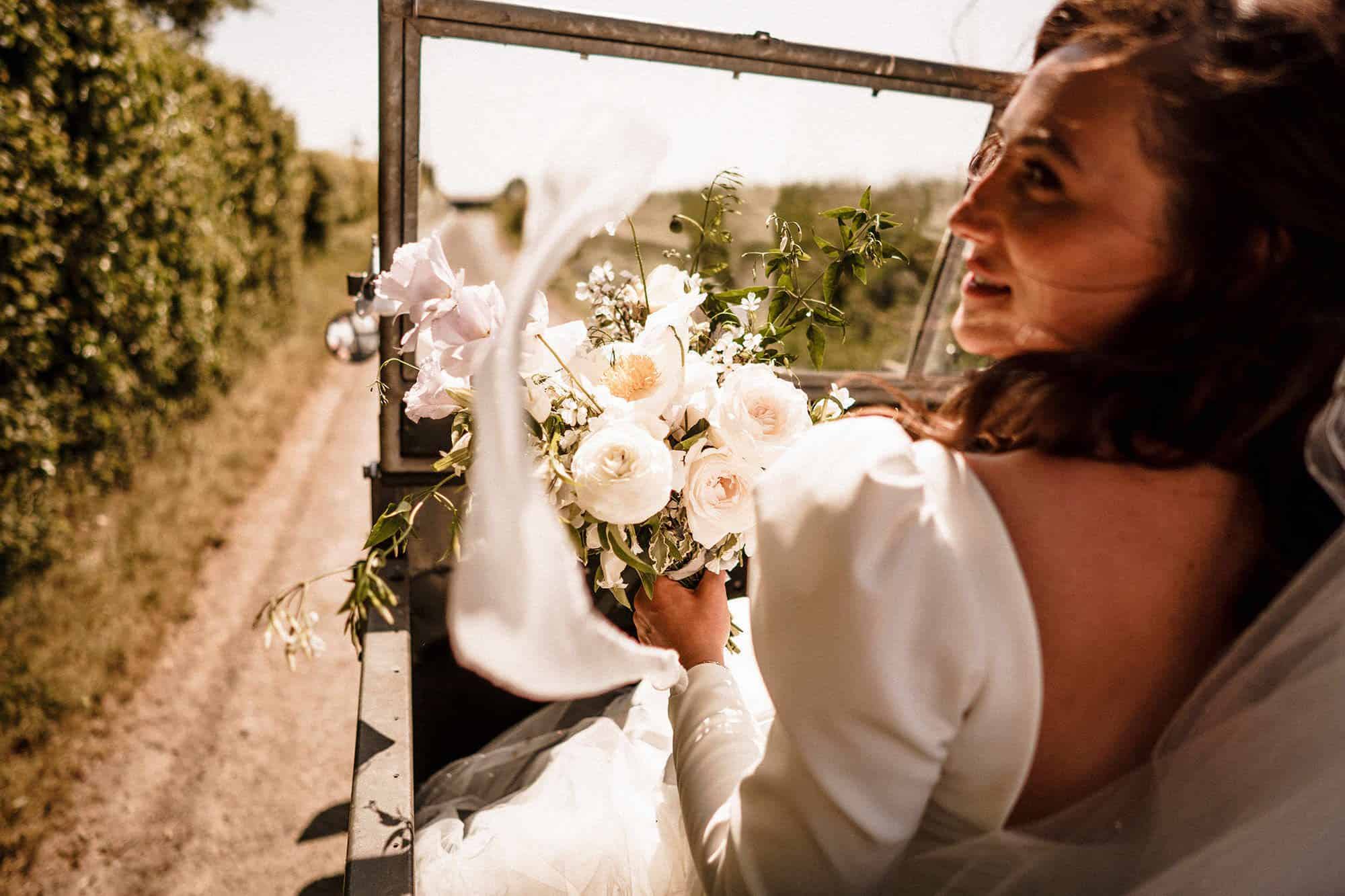 Bride with flowers at No3 Chateau wedding