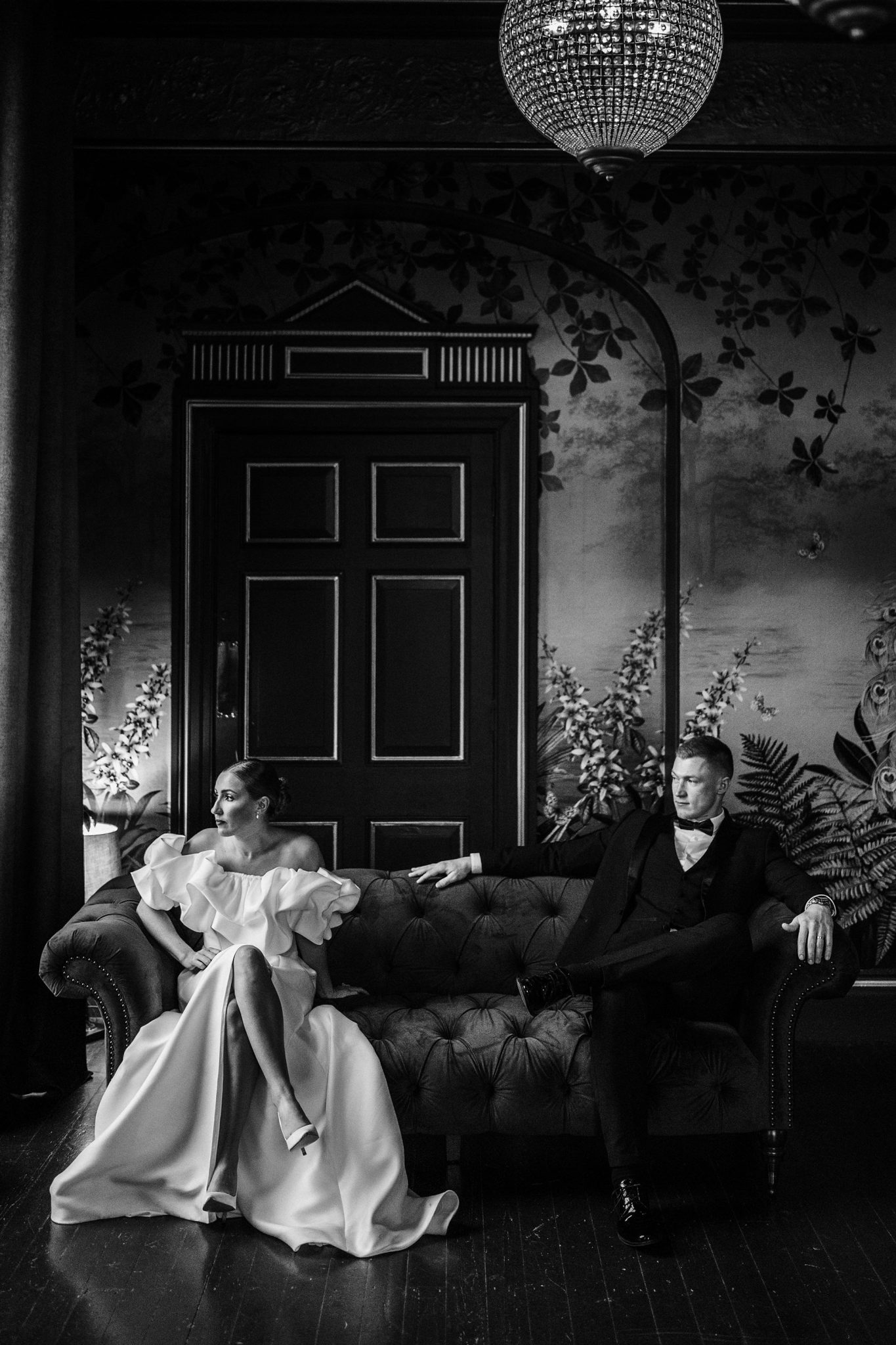 Bride and groom sat on a sofa