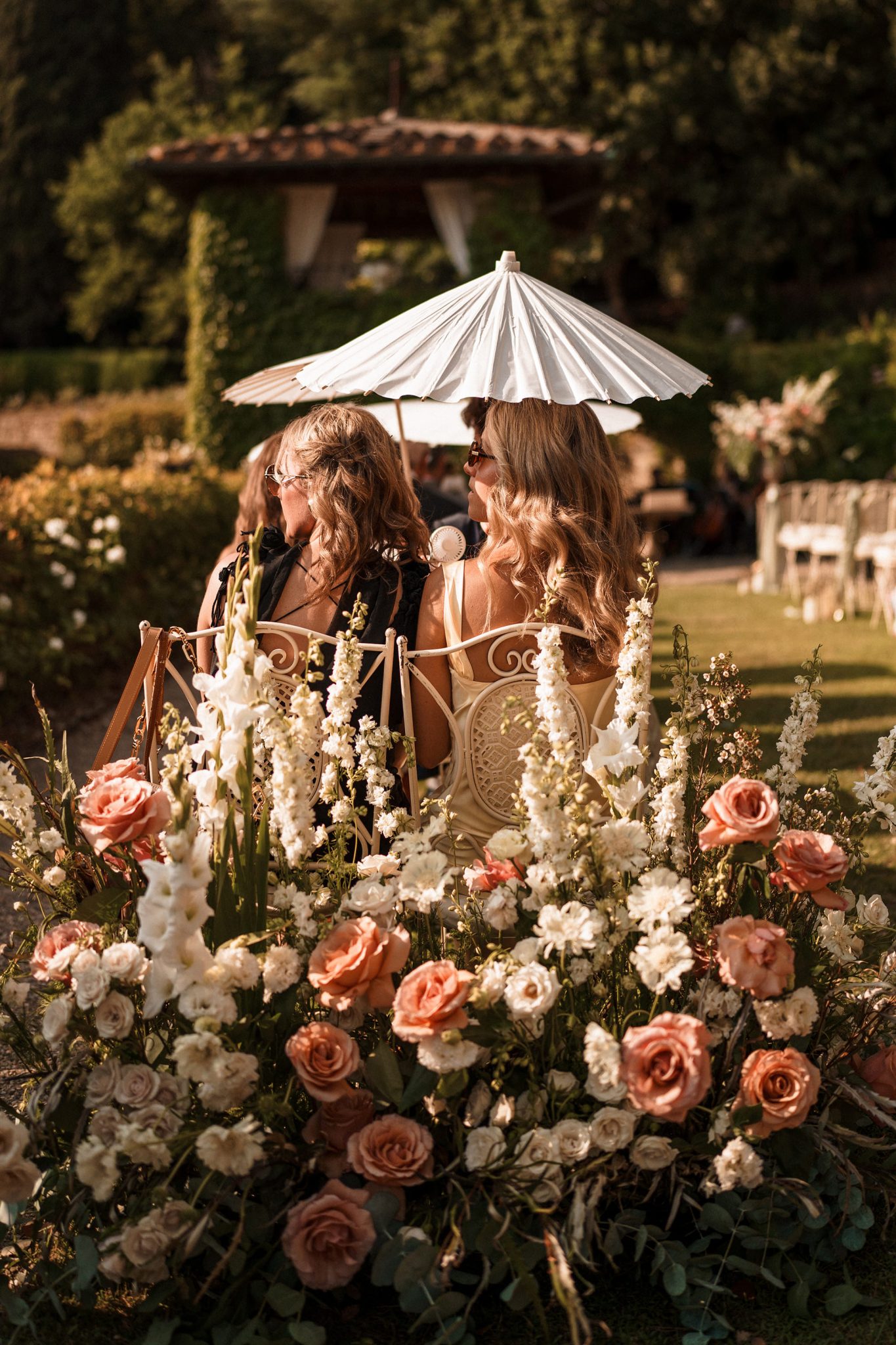 wedding guests waiting patiently for the ceremony to begin