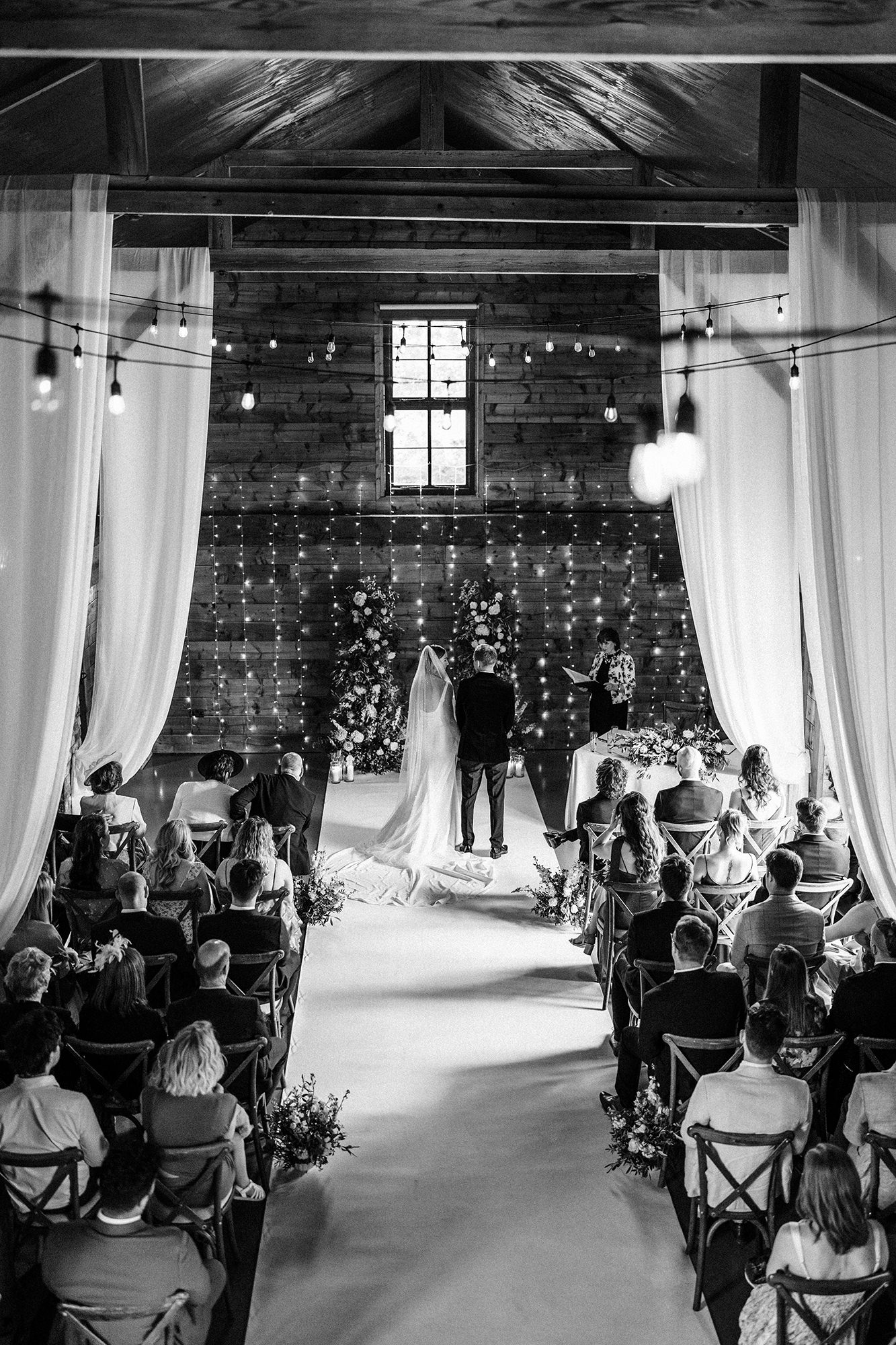 Indoor registrar ceremony setup with guests at Scarlett Hall in Cheshire