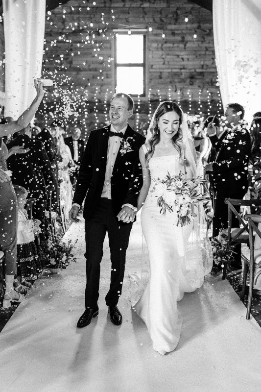 Wedding confetti moment outside Scarlett Hall venue in Cheshire