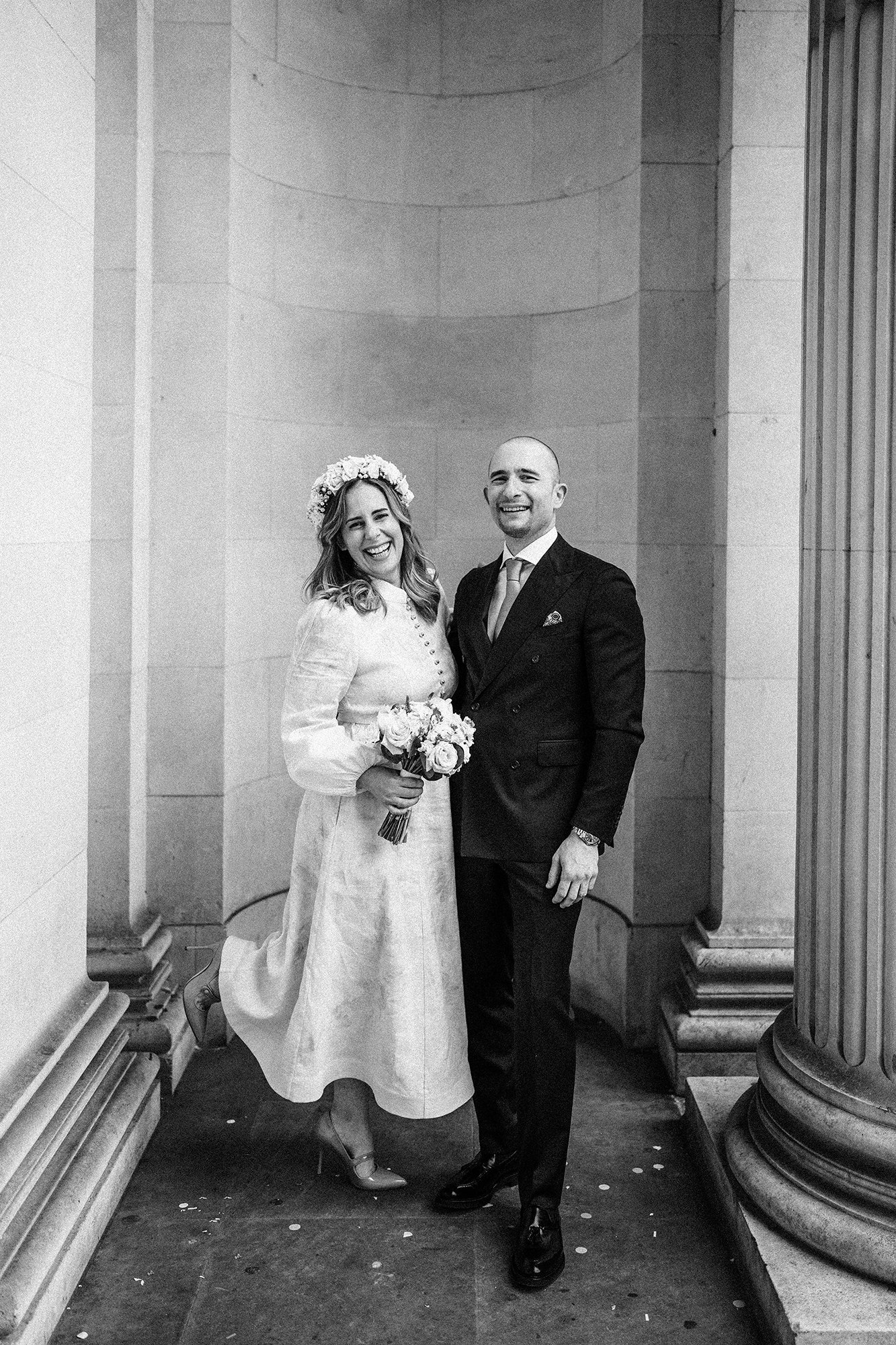 Bride and groom just married outside Marylebone Town Hall