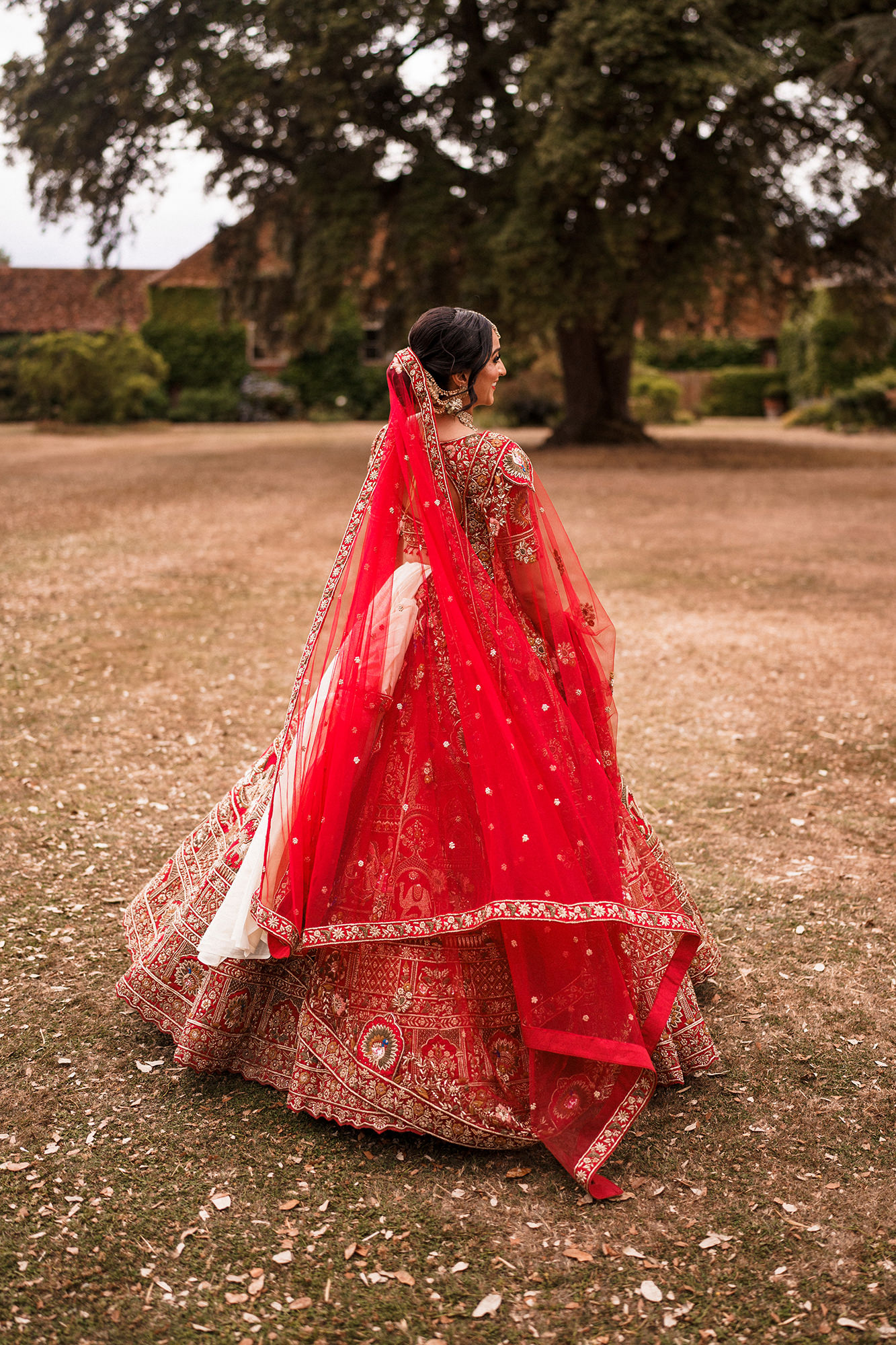 Braxted Park wedding confetti moment photographed in a natural documentary style