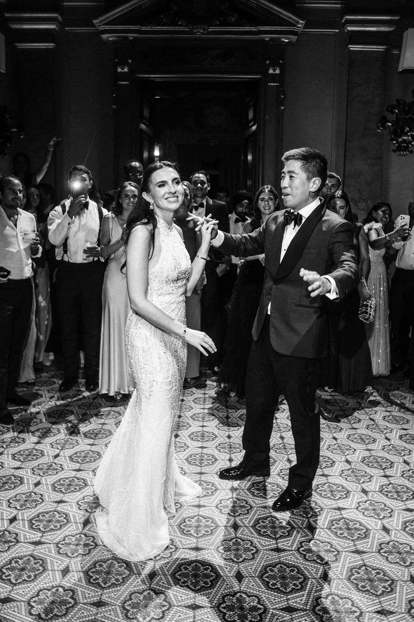 Guests watching Lara and Qiao’s first dance