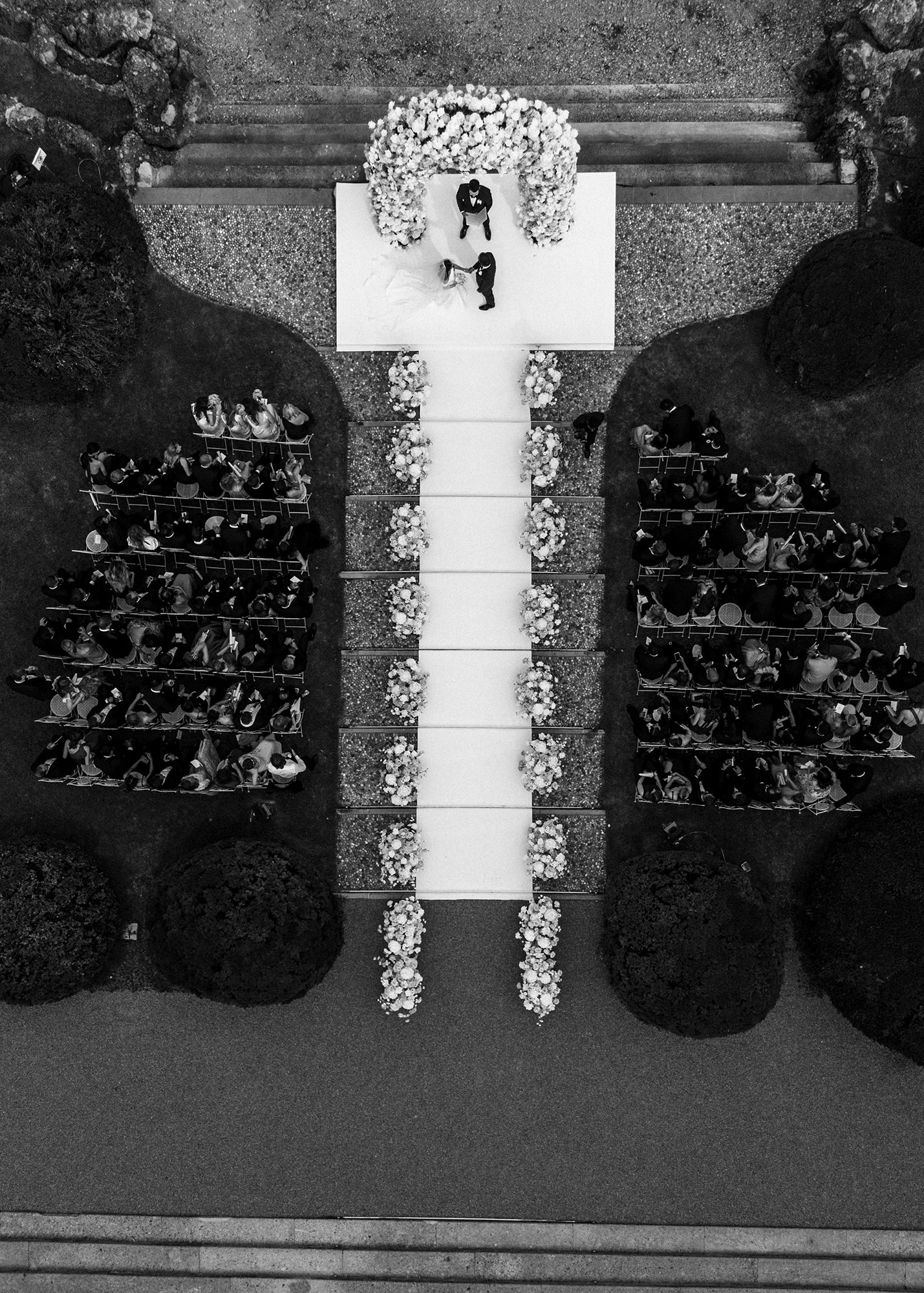 Guests outside Villa Erba with lake views