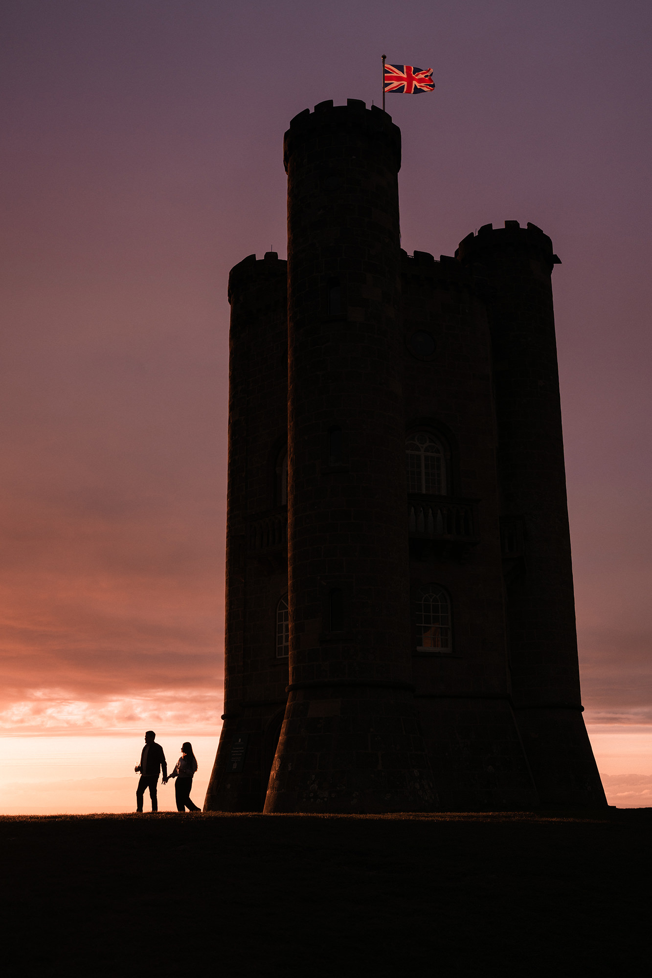 Emotional moment after a surprise proposal at Broadway Tower