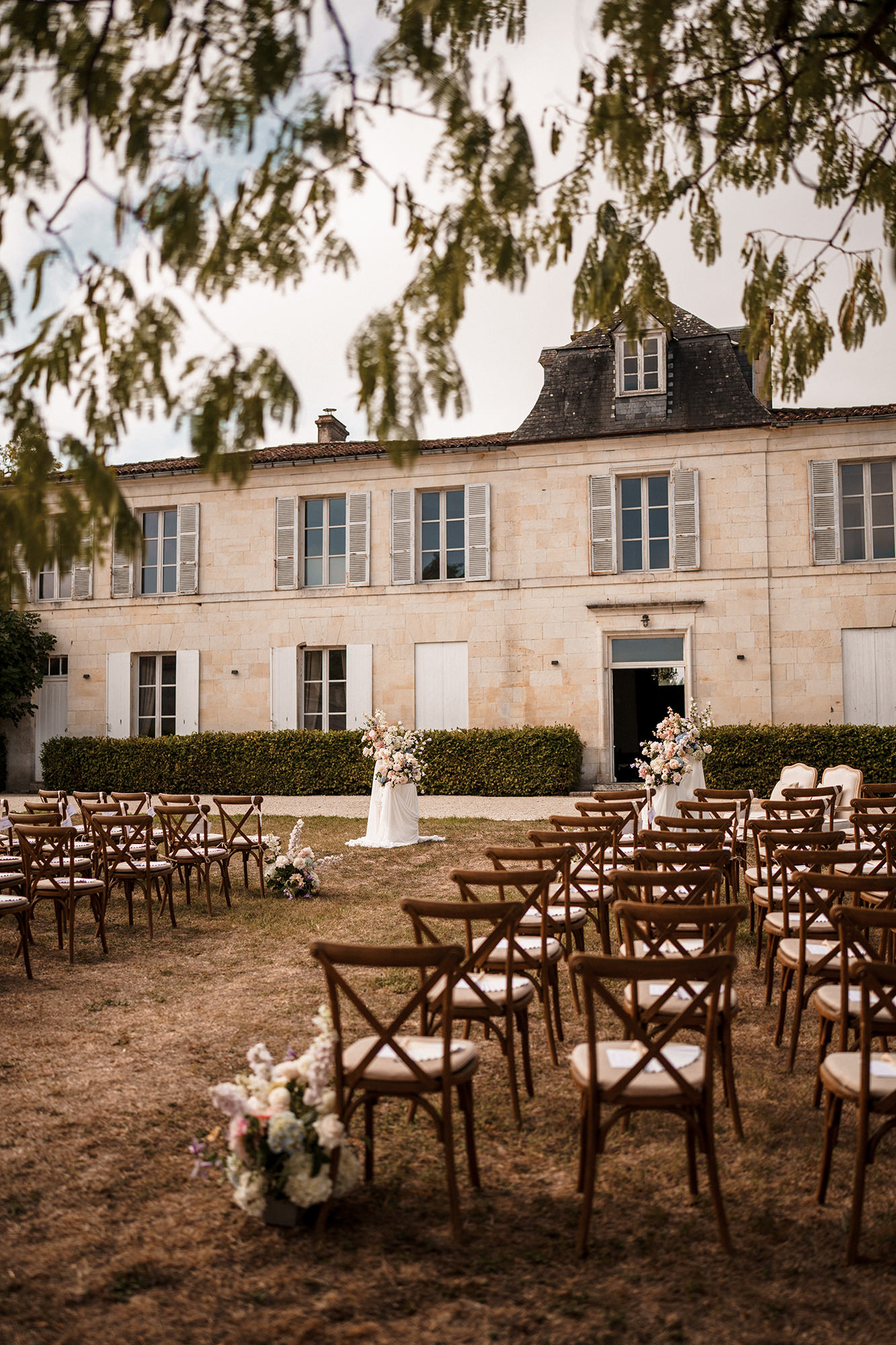 Outdoor wedding ceremony set up at La Cannonerie