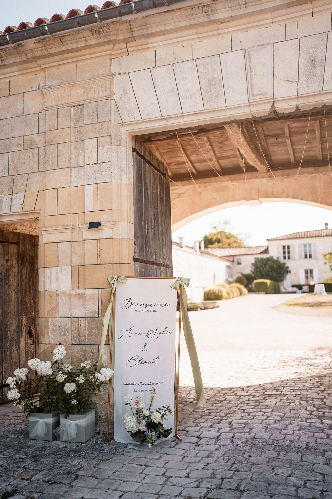 Anne-Sophie and Clément wedding welcome sign at the entrance to La Cannonerie