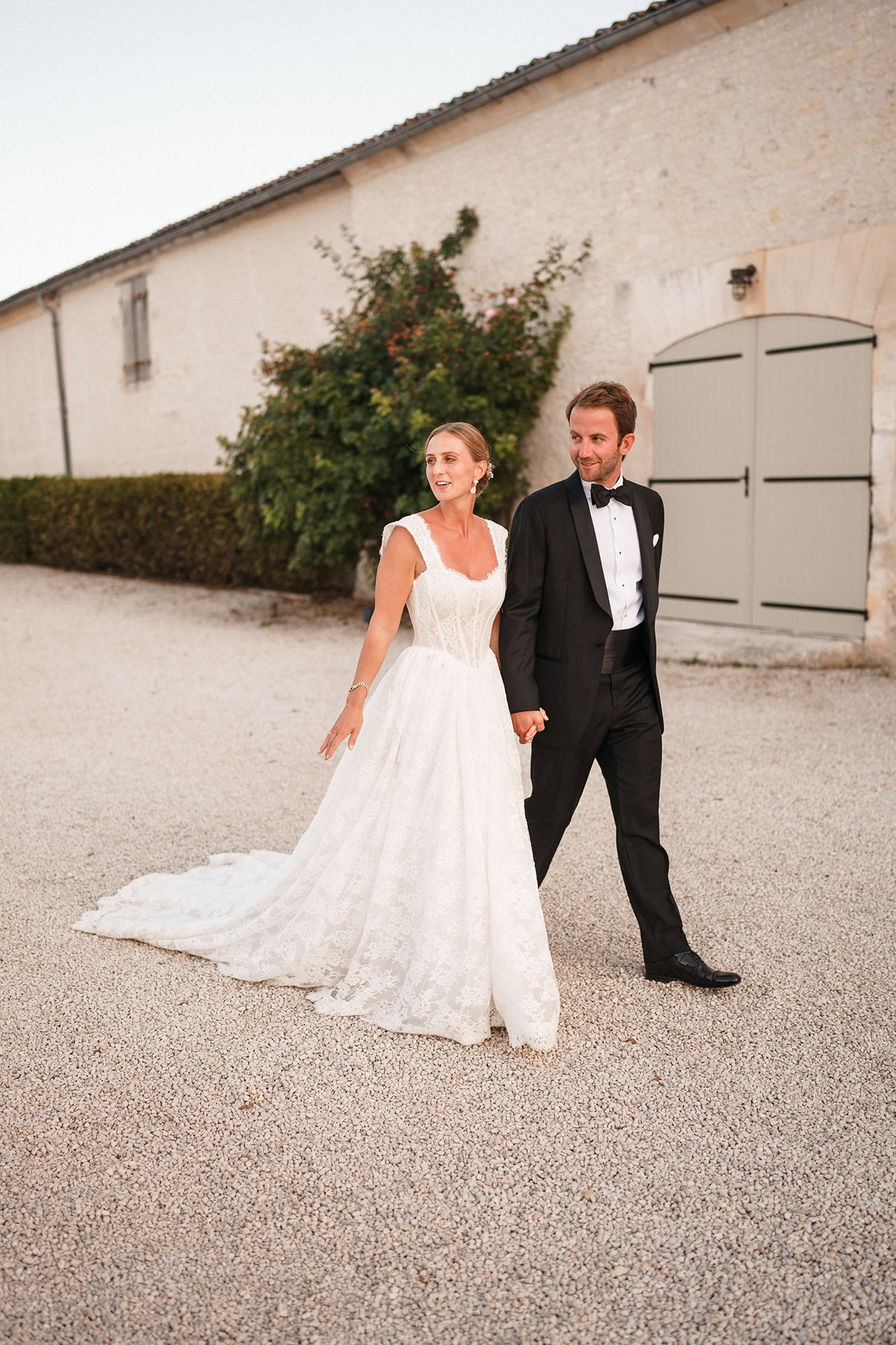 Wedding portrait using the stone buildings at La Cannonerie