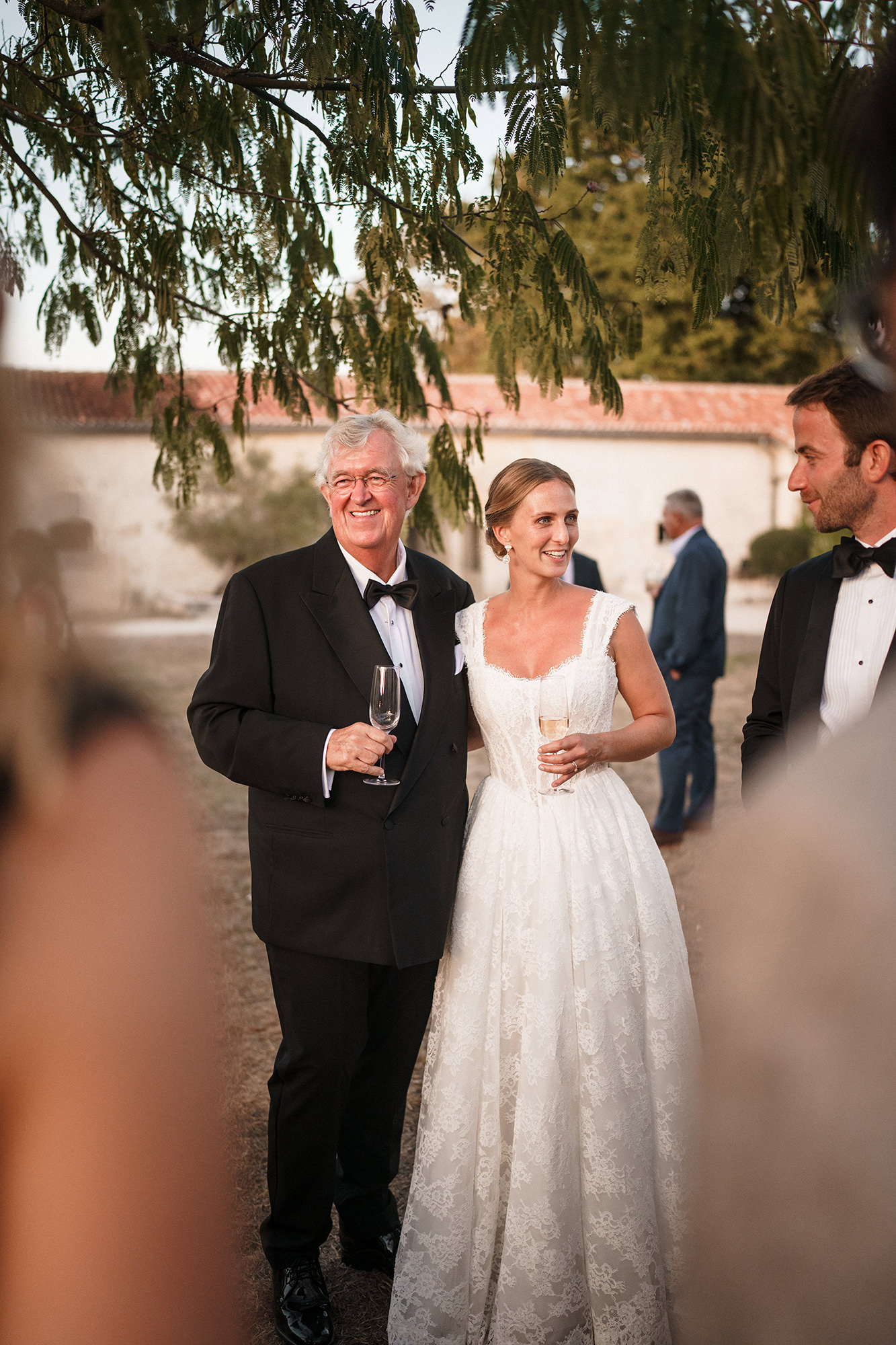 Anne-Sophie and Clément enjoying their wedding reception with guests