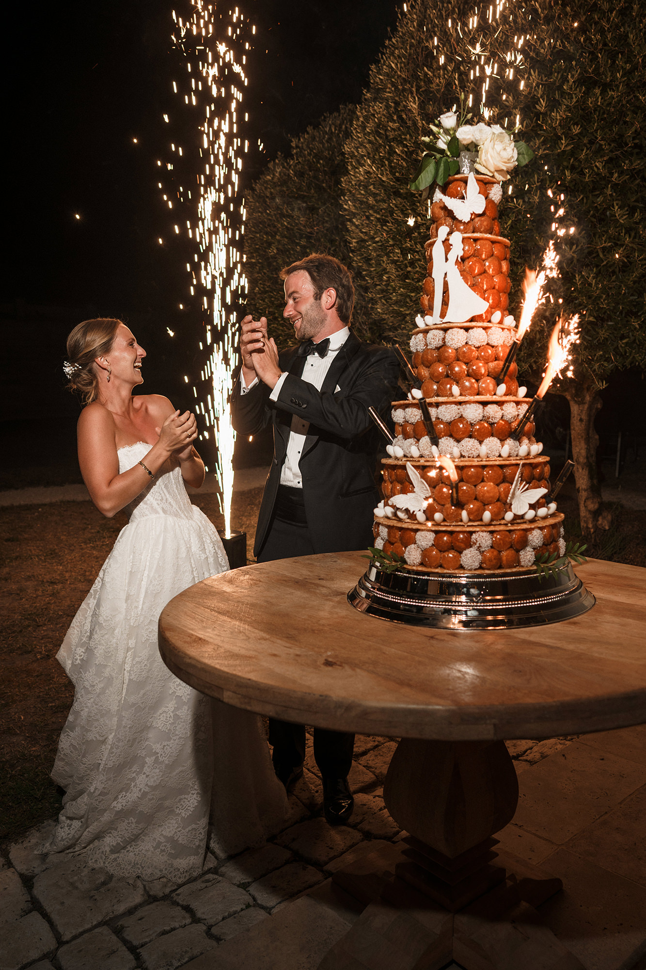 Anne-Sophie and Clément celebrating during their La Cannonerie wedding