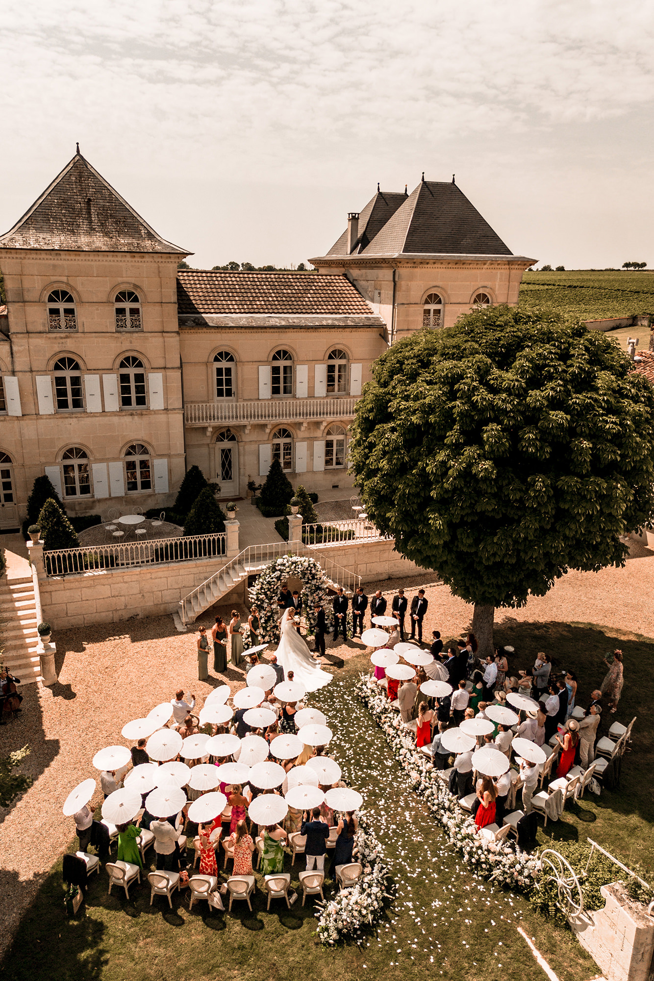 Outdoor wedding ceremony in the grounds of a French château