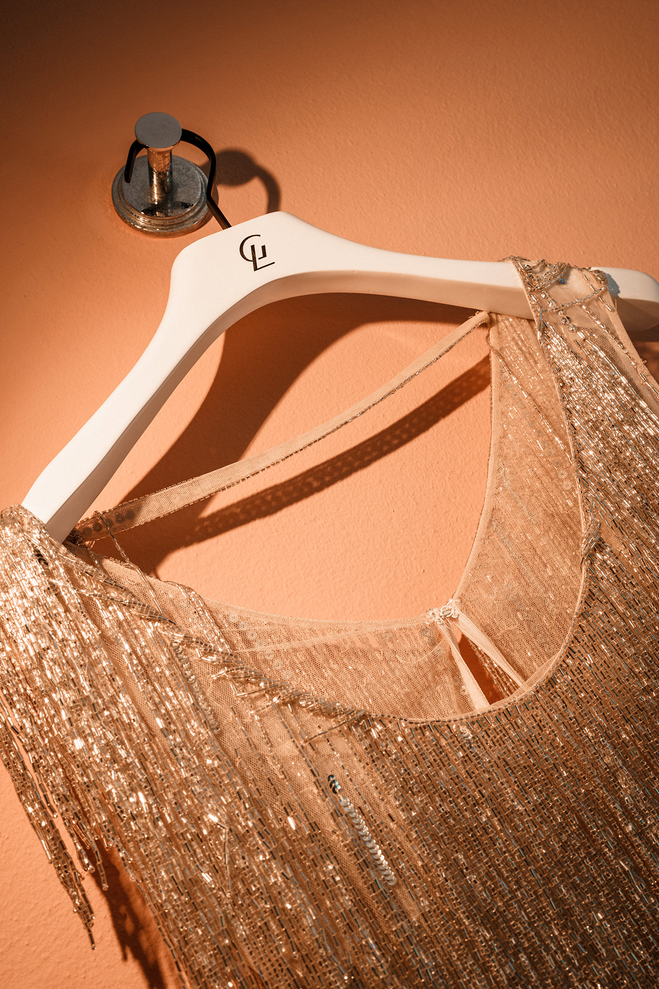 Sparkling evening dress photographed before a wedding celebration in France