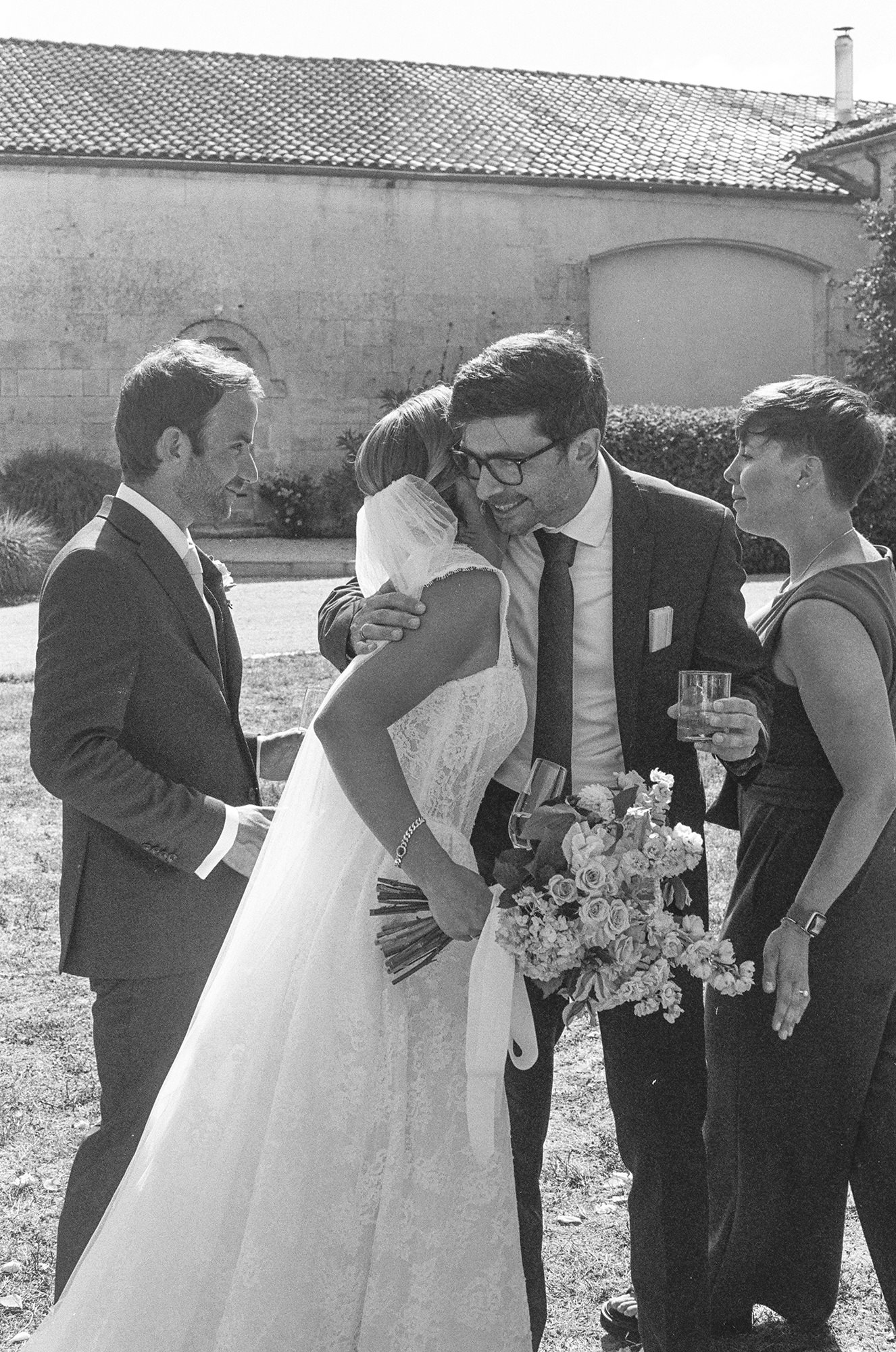 Black and white 35mm film wedding photograph from Anne-Sophie and Clément's wedding at La Cannonerie